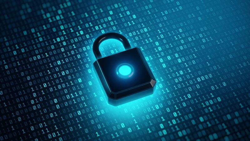 Cyber security padlock on code - A futuristic glowing padlock sits atop a matrix of binary code ...